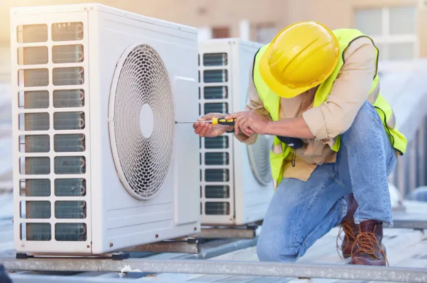 brown cardboard boxes on black steel rack