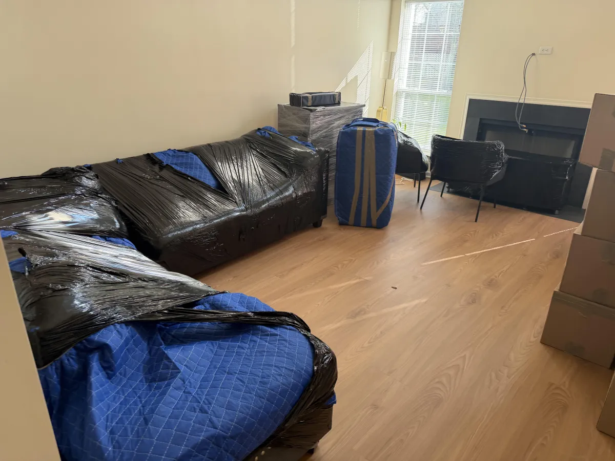 KIMS full packing job complete — living room furniture wrapped and secured in Burlington County NJ, ready for loading
