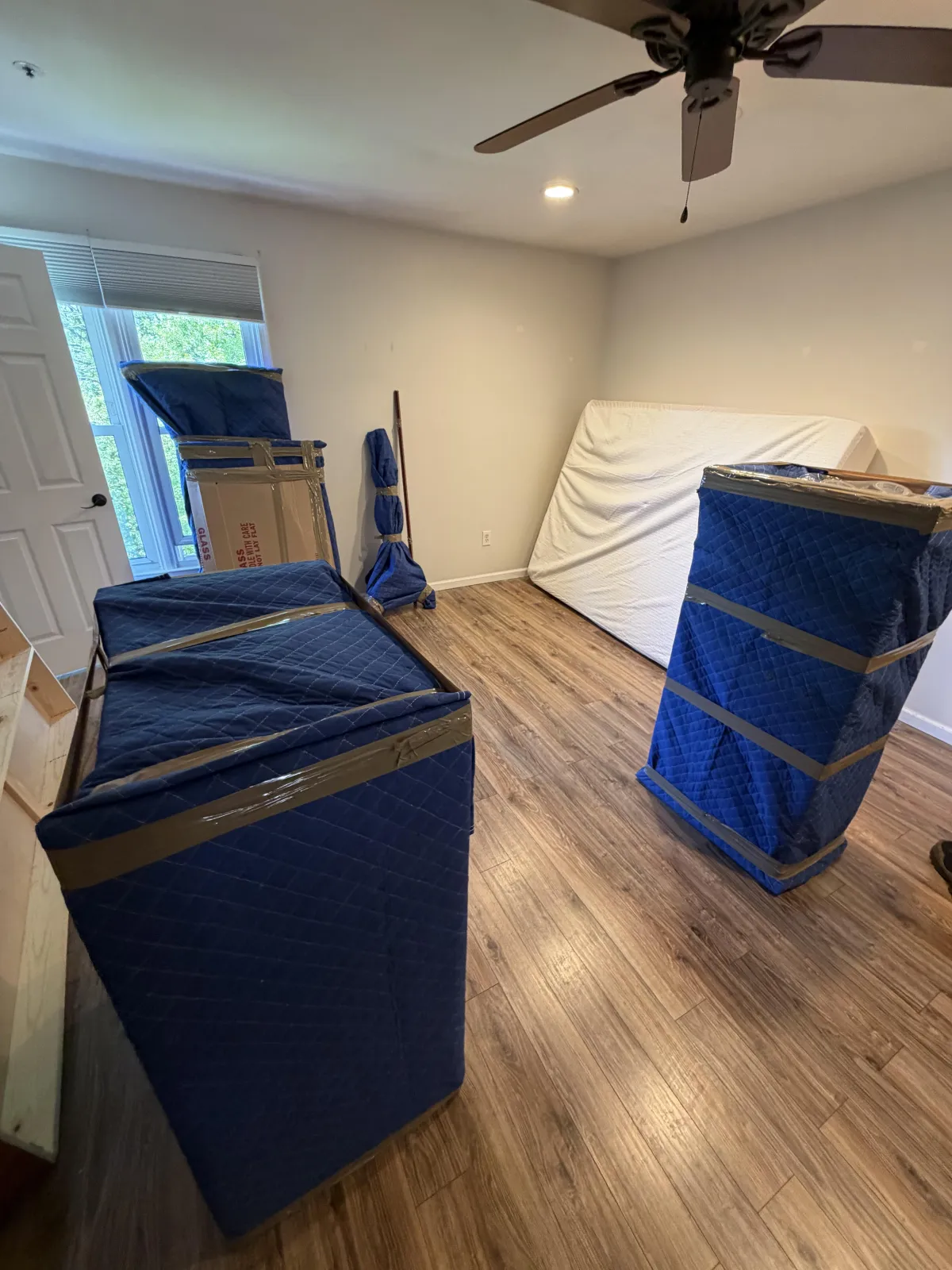 Professional furniture protection and packing services preparing household items for a local or long-distance move
