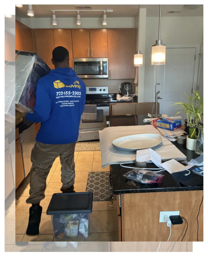 Professional packing specialist carefully wrapping and protecting household furniture inside a Toms River, New Jersey apartment before moving day.