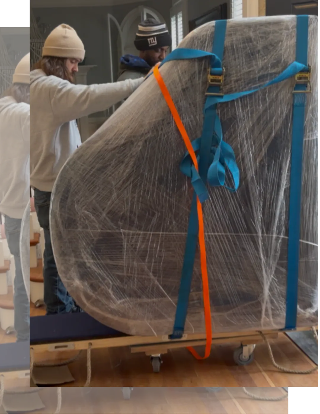 Professional piano moving services using specialized equipment and protective wrapping for safe transportation
