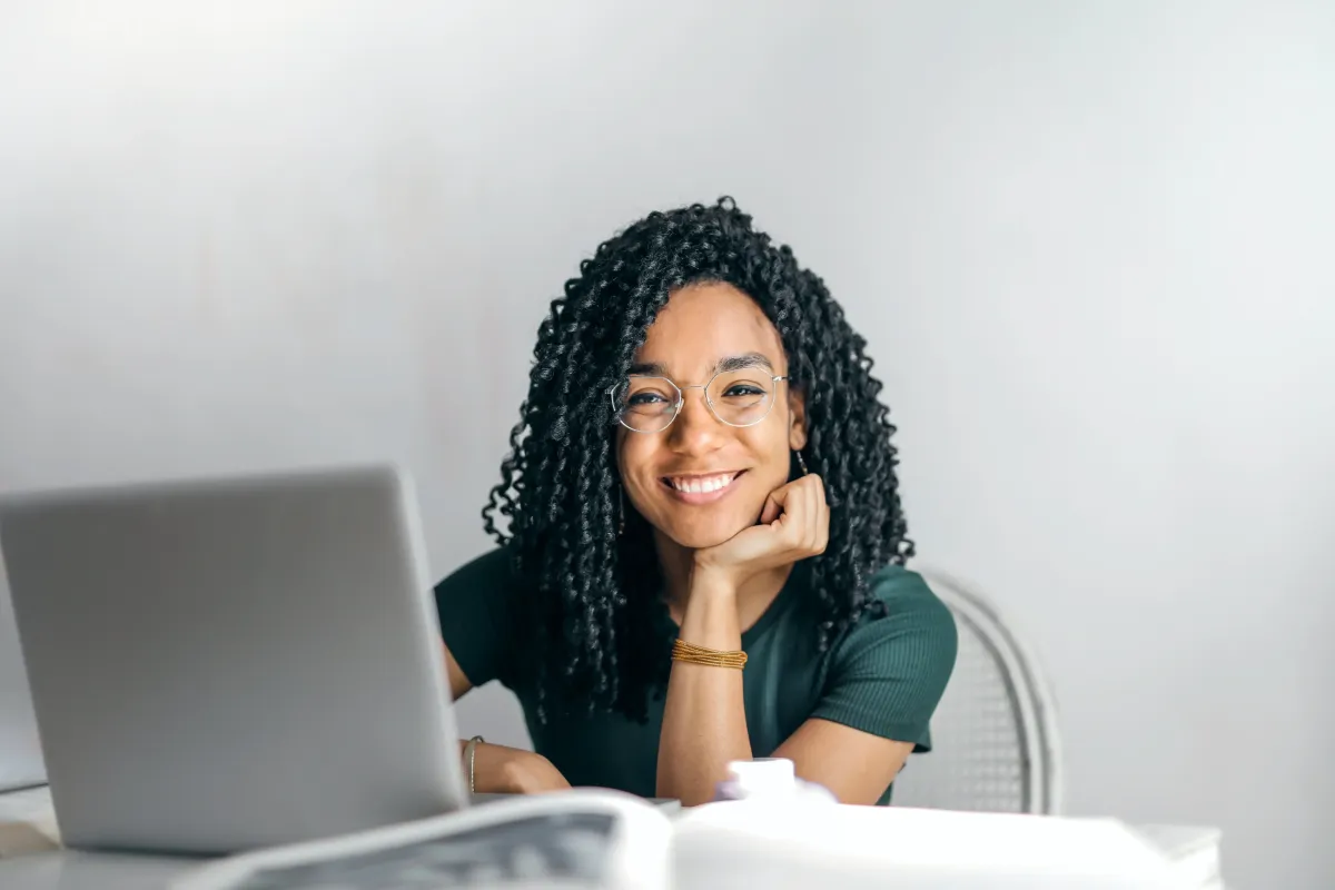 woman looking forward at desk