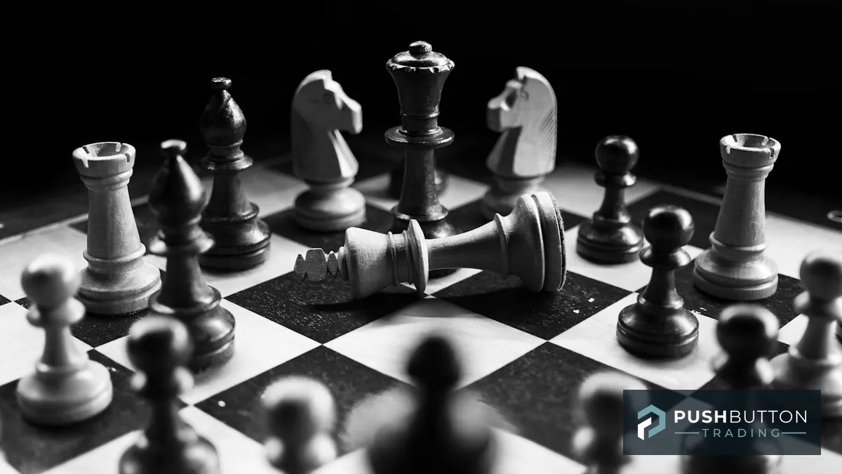 Chess pieces mid-game on a board, symbolizing portfolio strategy