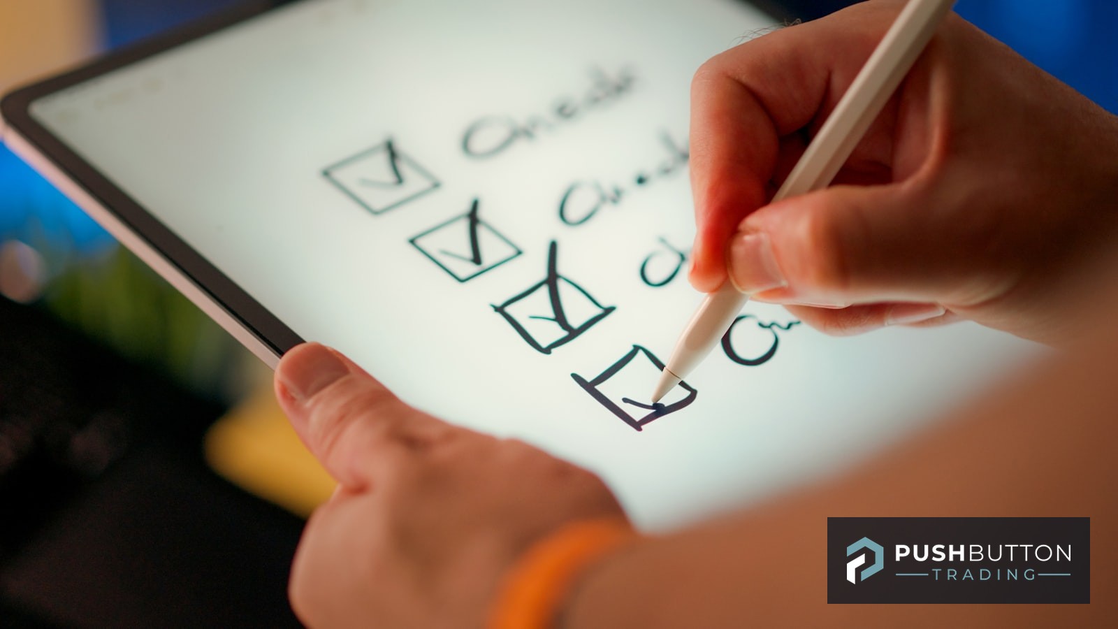 Hand checking items off a checklist on a tablet