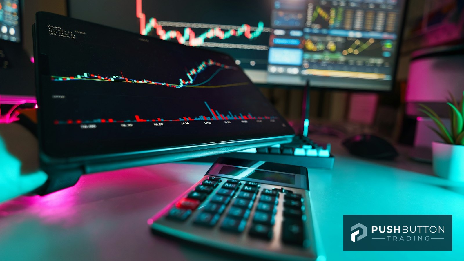 Trading desk with candlestick charts on screens and a calculator