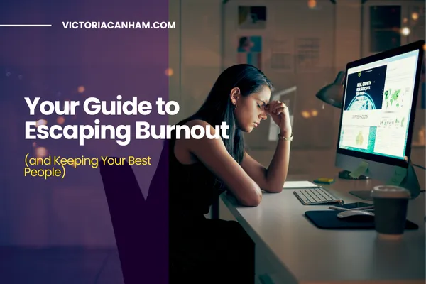 Victoria Canham Consultancy | A tired woman with her head in her hand sits in front of a computer screen, representing burnout. The image has a dark, moody filter and the title of the article, "Your Guide to Escaping Burnout (and Keeping Your Best People)" is overlaid on the left side.