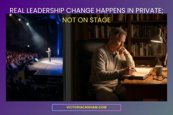 Victoria Canham Consultancy | A split-screen illustration contrasting public leadership performance with private executive work. The left side shows a blurry, bright conference stage; the right shows a senior leader sitting in a quiet, dimly lit room, reflectively writing in a journal.