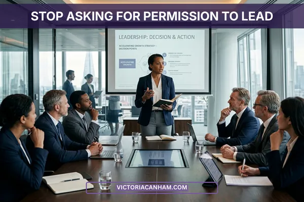 Victoria Canham Consultancy | A professional, high-stakes boardroom setting where a female executive stands at the head of a sleek wooden table, leading a meeting with confidence. She is gesturing towards a presentation screen that reads "Leadership: Decision & Action," while a group of diverse senior professionals sits around the table, listening intently. Large windows in the background reveal a modern city skyline, emphasizing a high-level corporate environment.