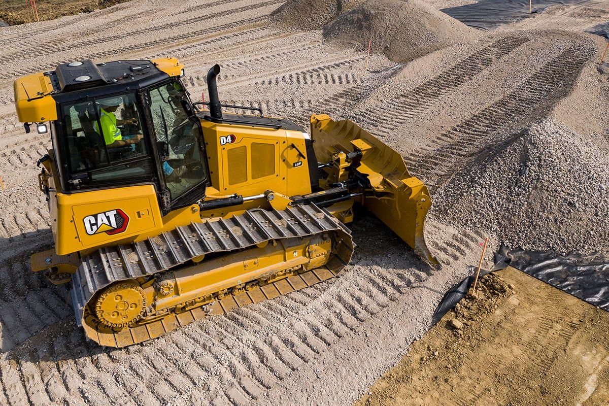 a dozer pushing gravel