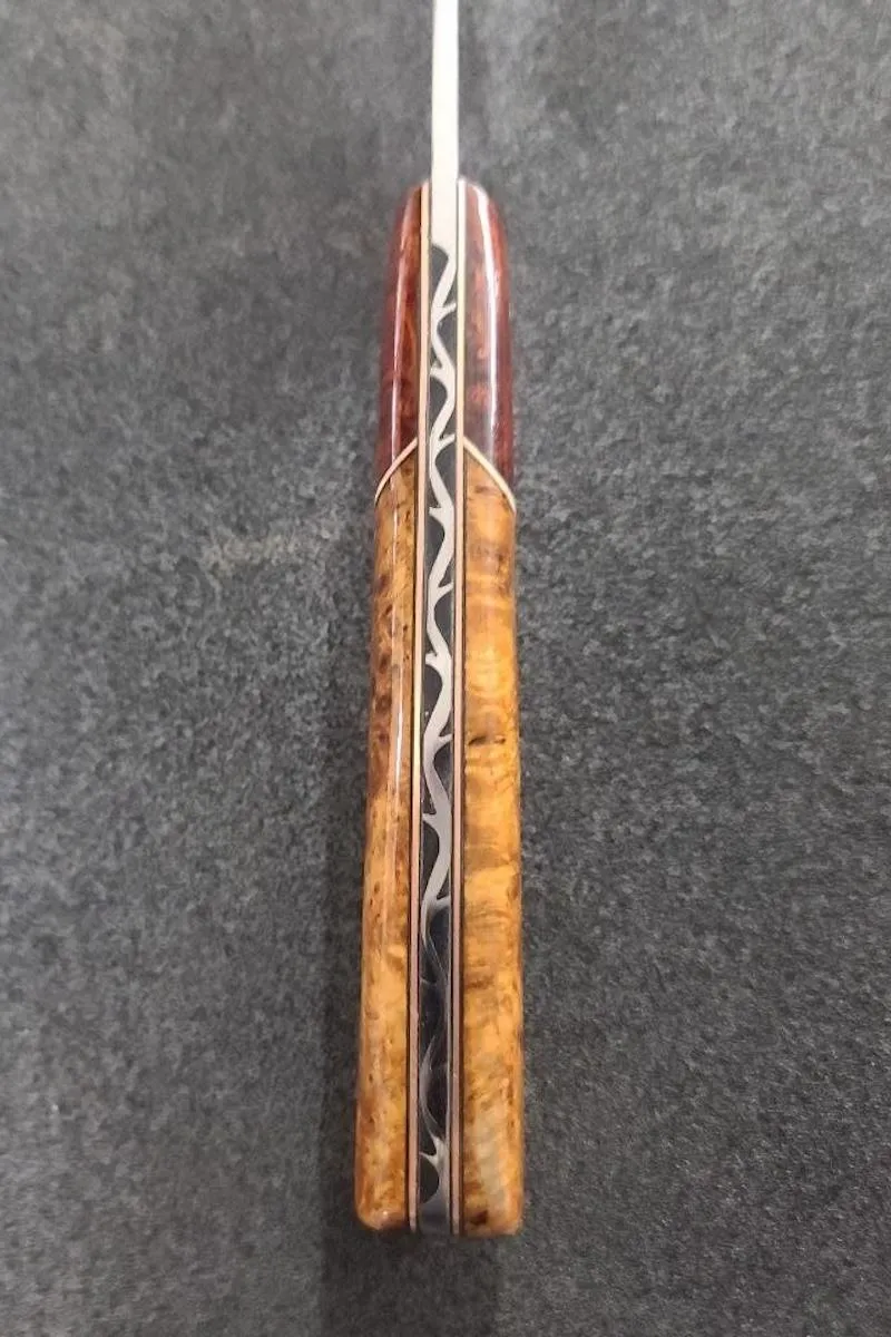 handmade 190mm Western Chef's knife combines a robust 52100 steel blade with a luxurious handle made from Golden Amboyna burl and Red Logwood, accented with copper spacers