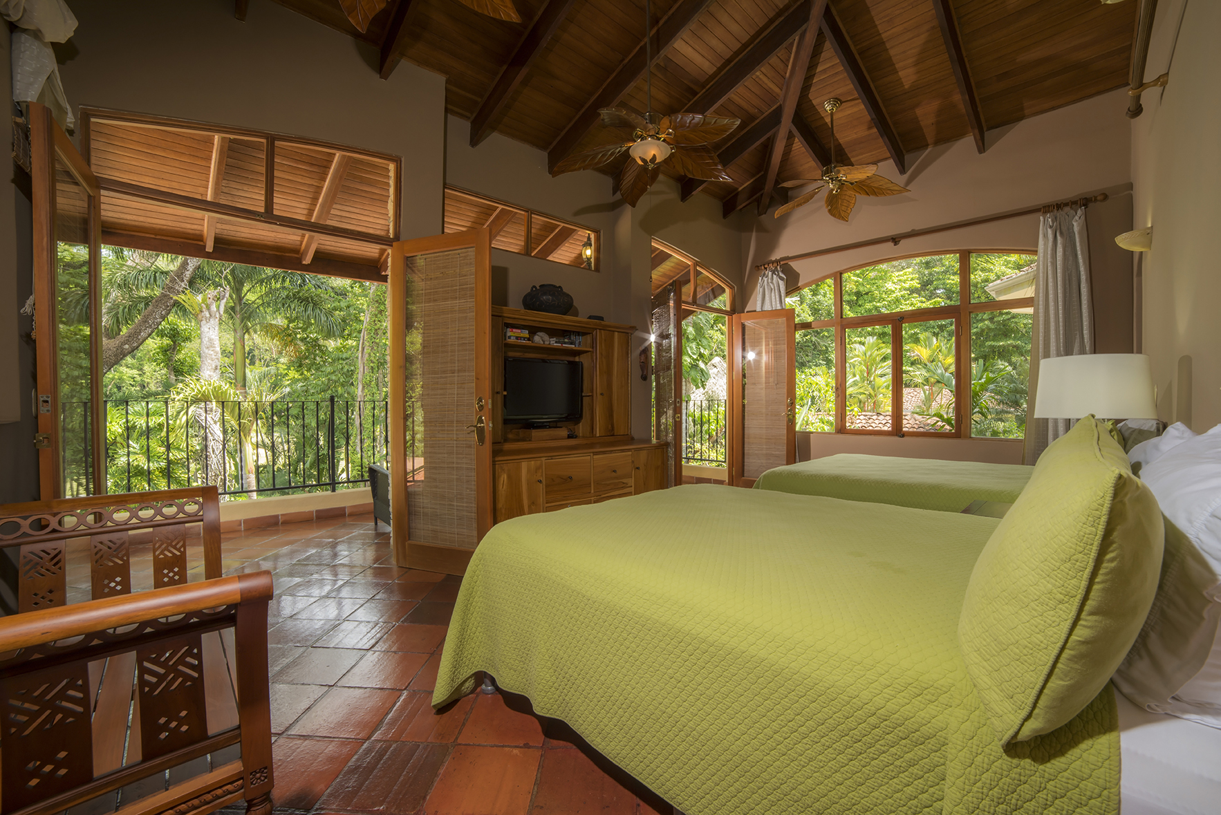 Master Suite with balcony and pool view at Casa Buen Dia