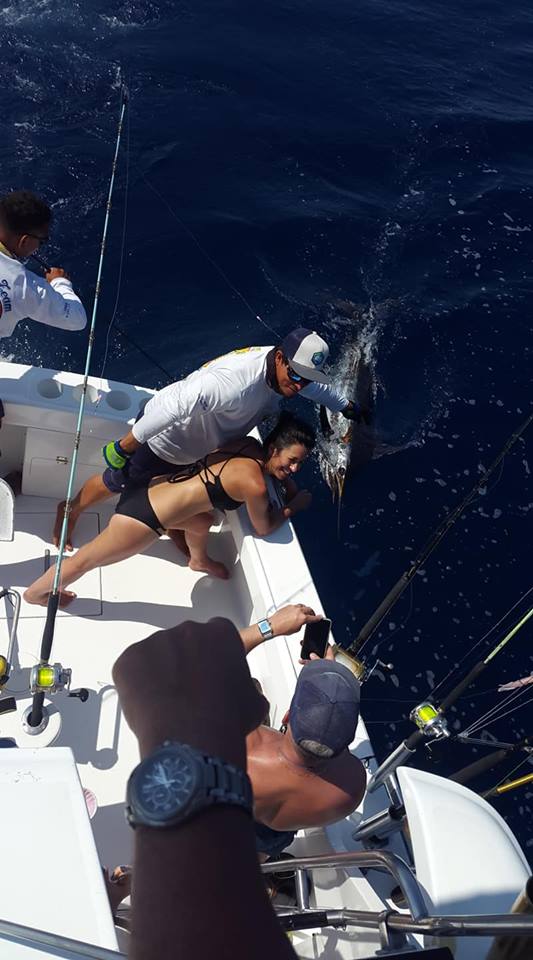 Nice blue marlin, and very happy clients! 