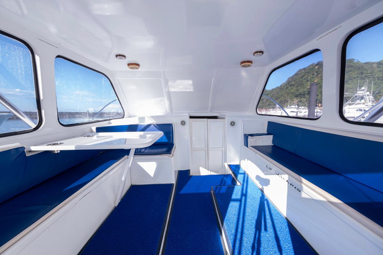 Enjoy our air-conditioned cabin when you venture out on the Good Day Too boat! Los Suenos, Costa Rica 