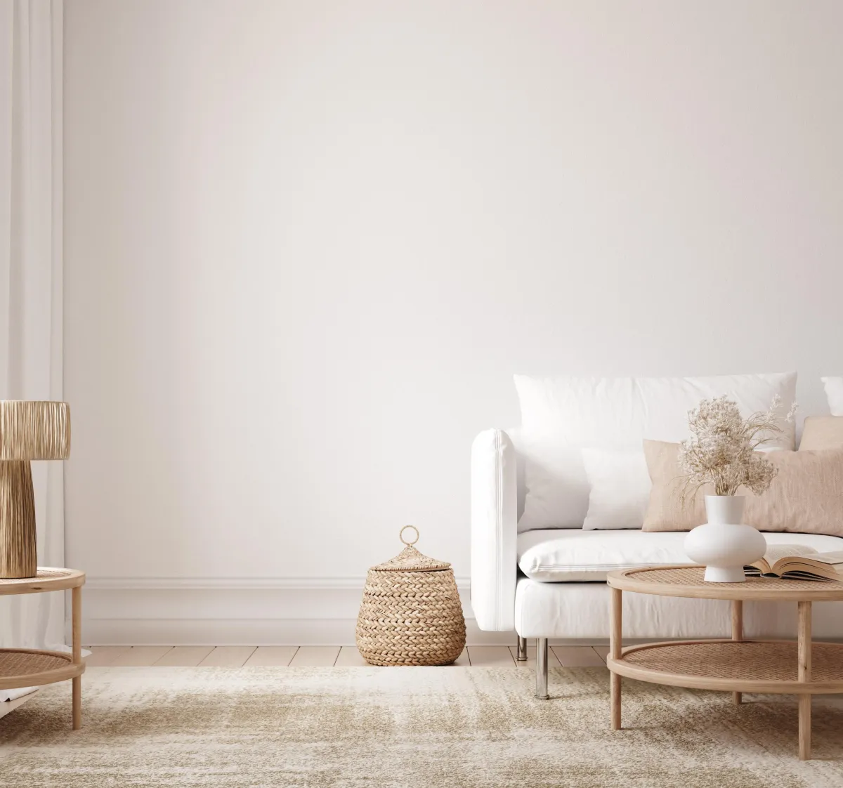 Bright living room with patterned hardwood parquet flooring, large grid windows, a red sofa, and indoor plants.