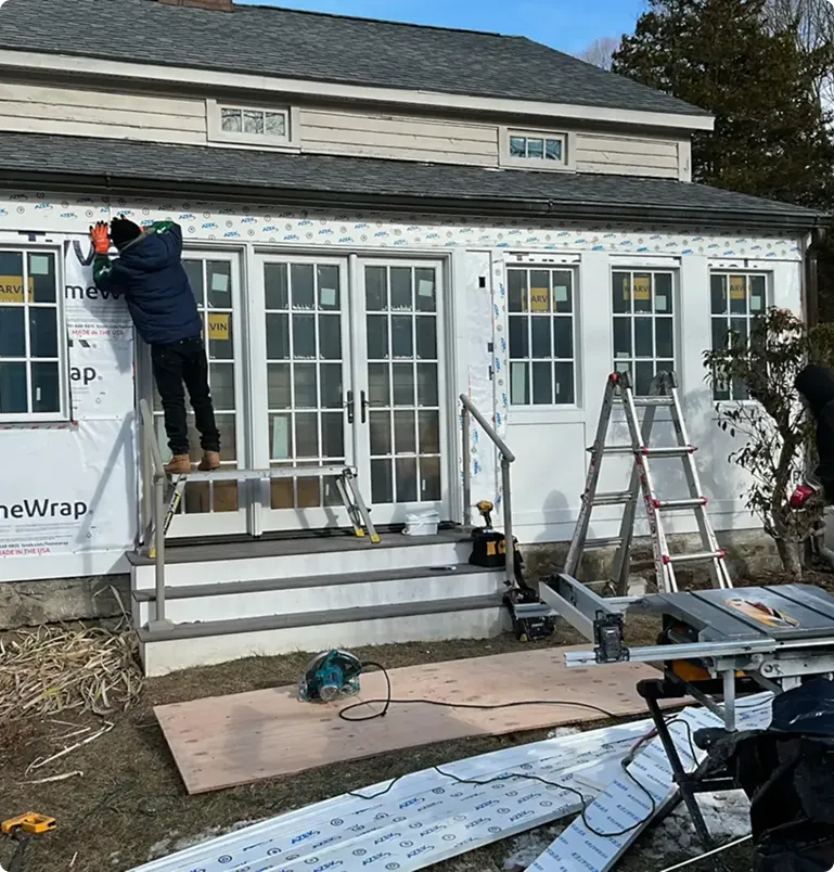 Professional bathroom remodelers from Rhode Island Bath & Shower working on a renovation project