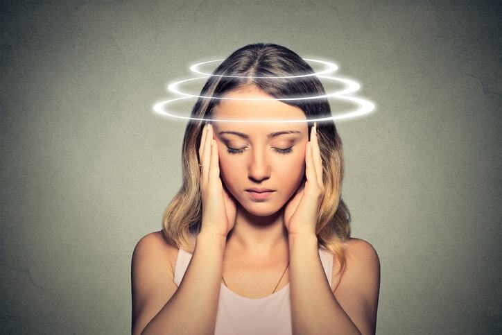 A girl holding her brain