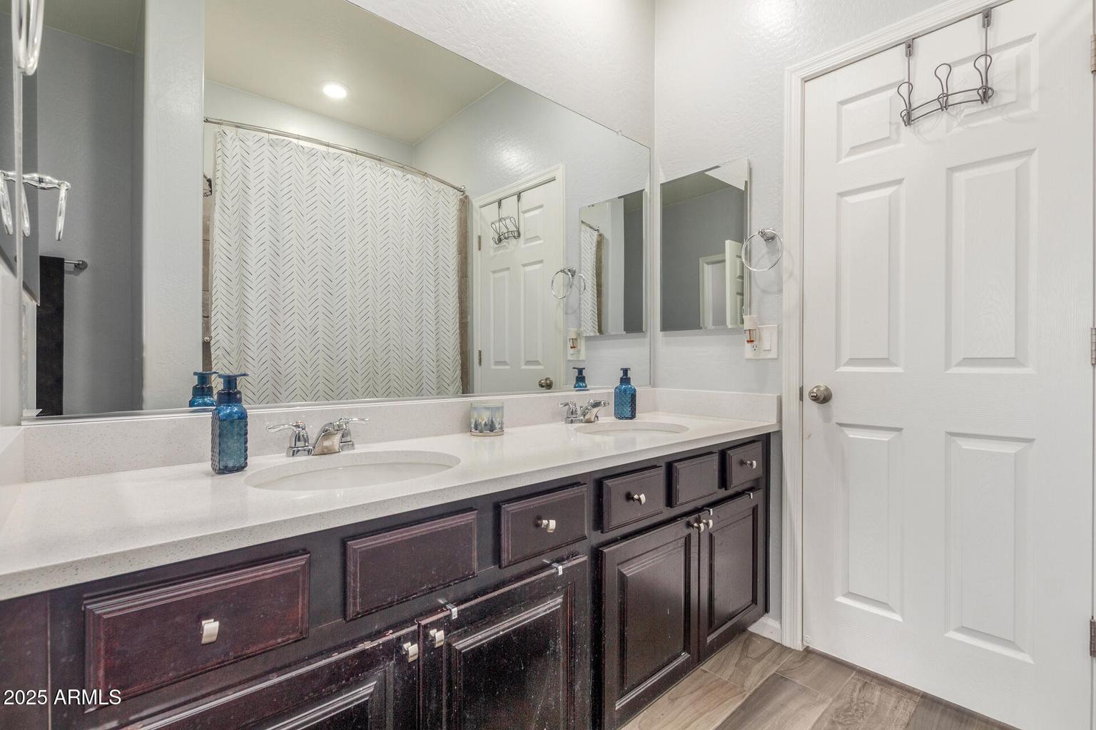 bathroom with double vanity