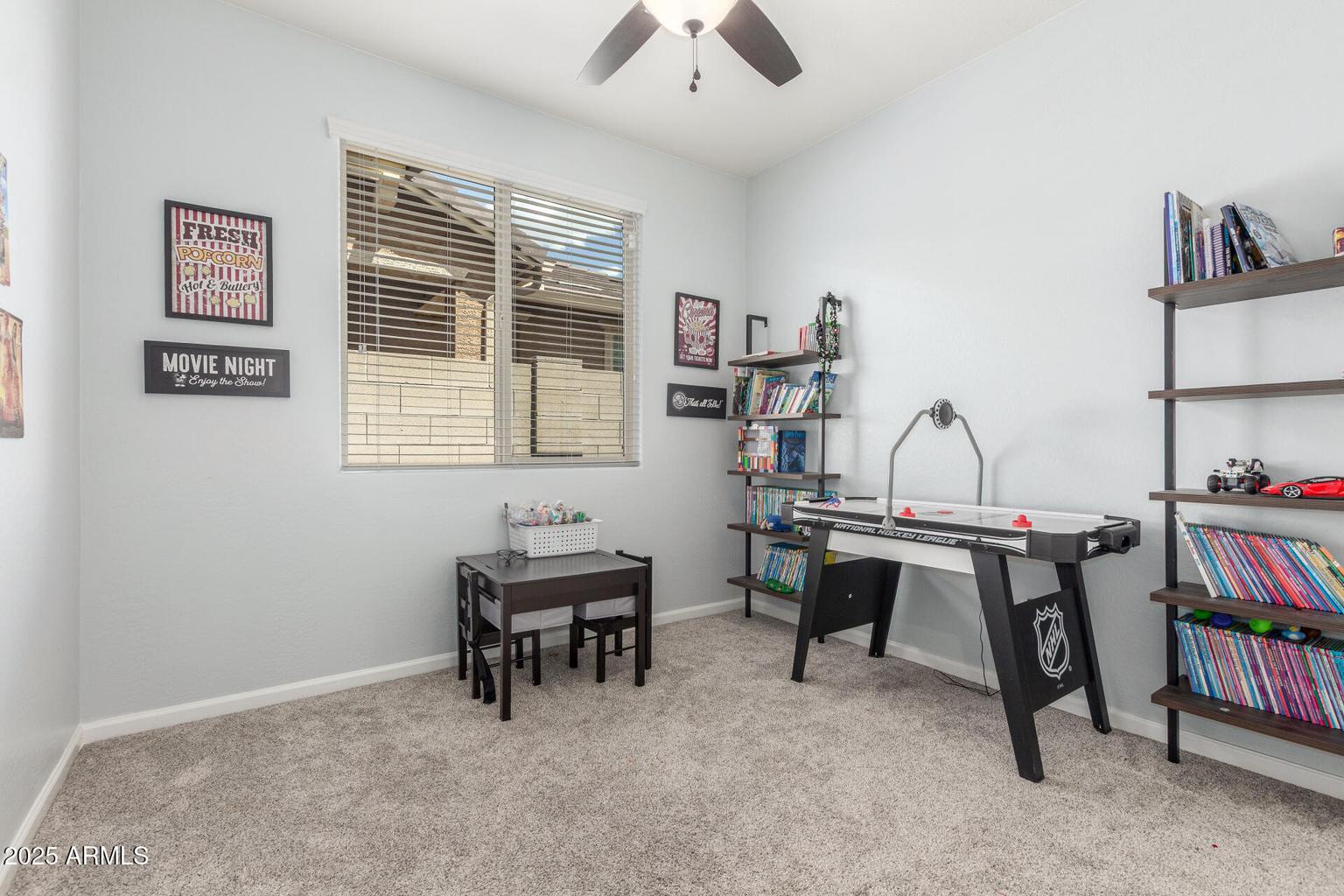 bedroom with air hockey table