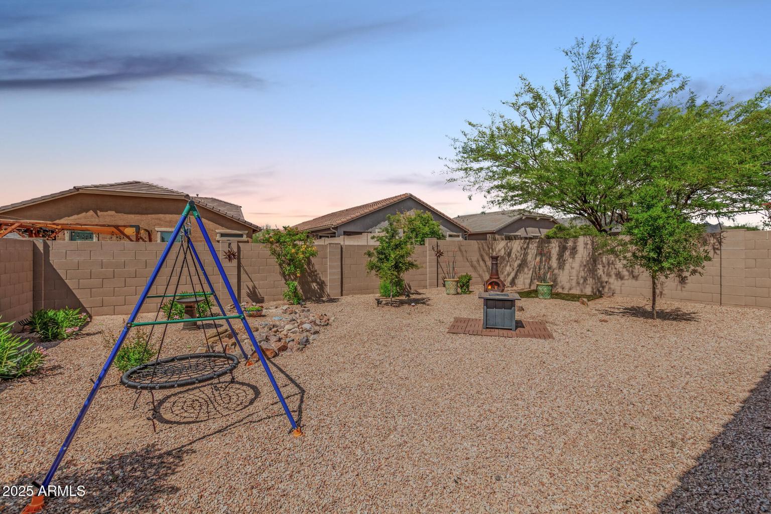 backyard with tree and swing 