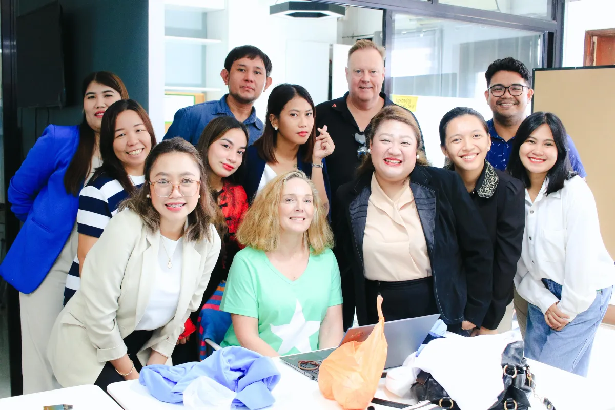 Decorative case study image showing cloud migration dashboard with engineers coordinating via video