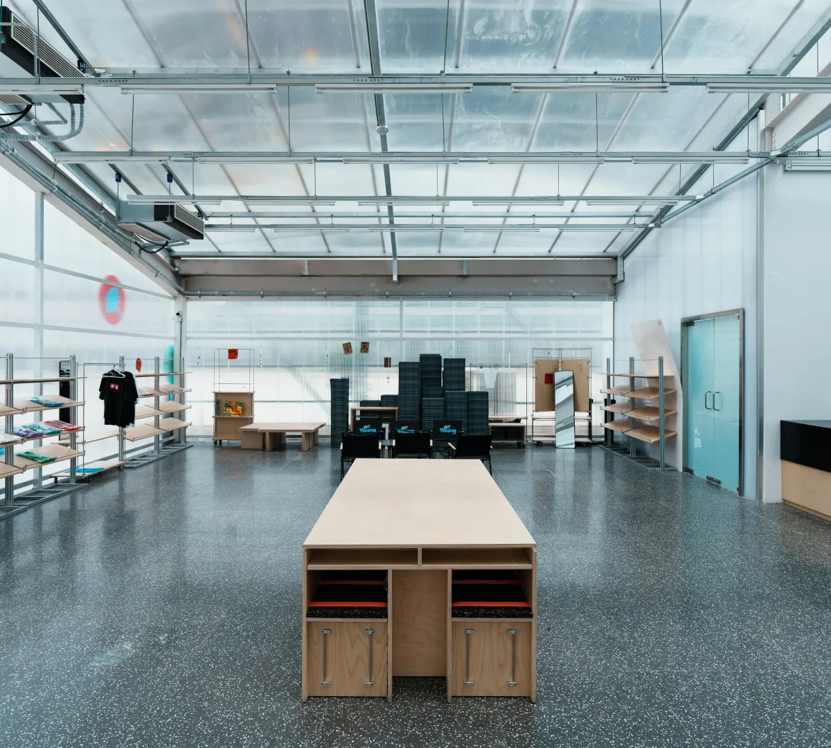 open partial empty retail space with speckled floor