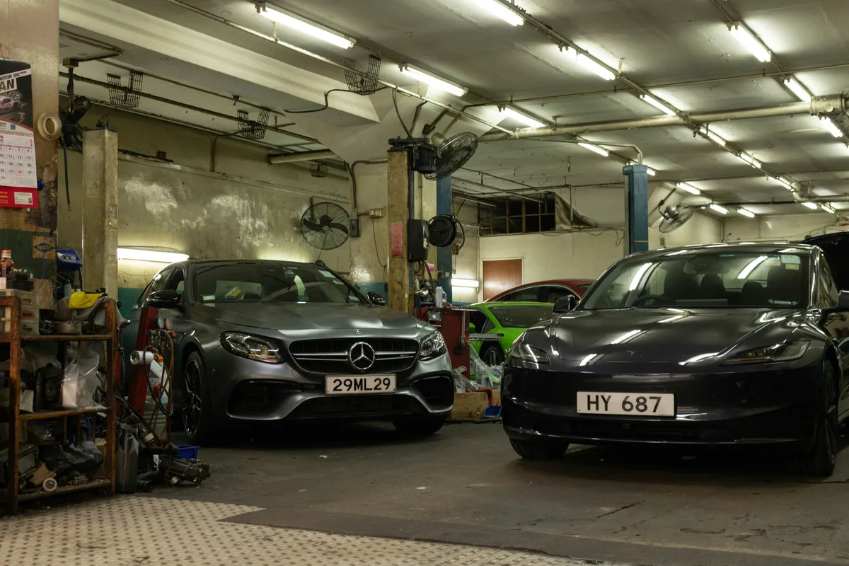 mechanic workshop epoxy floor with cars