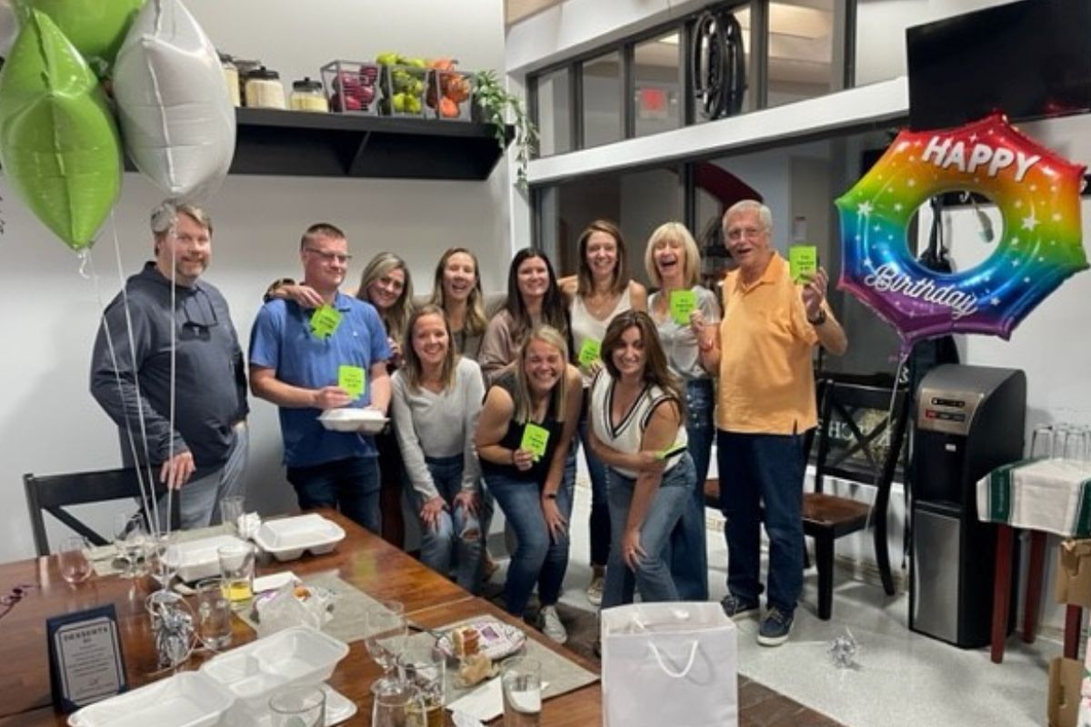 Guests celebrating a birthday party during a private cooking event at The Learning Kitchen