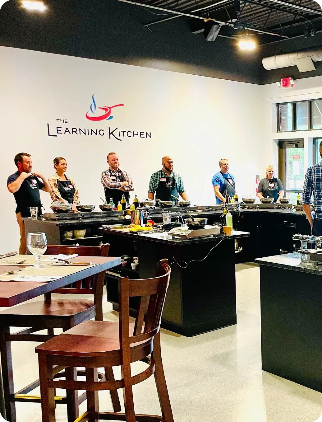 hands-on cooking class in Cincinnati guests cooking at The Learning Kitchen