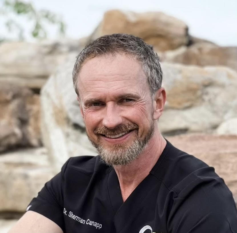 Dr. Sherman Canapp with an athletic dog patient