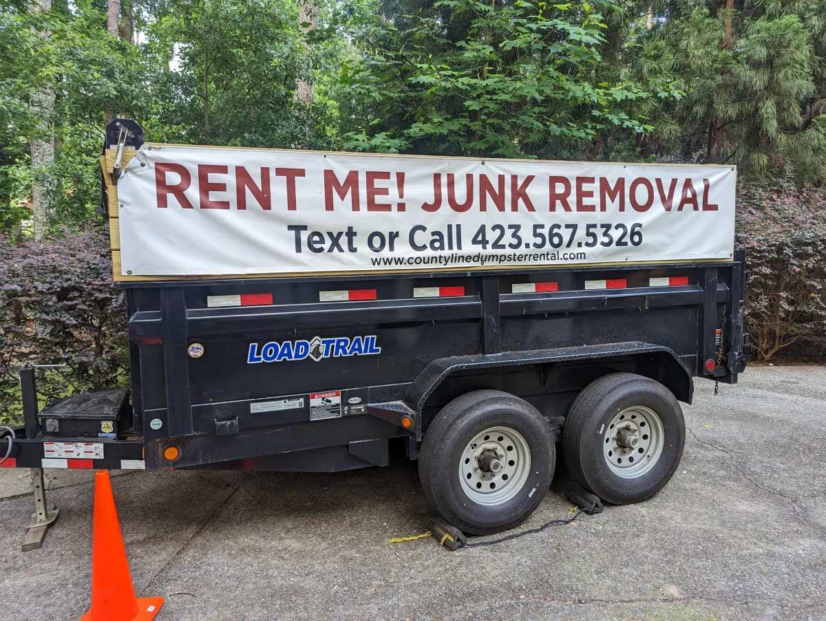 "Construction debris disposal in Cobb County, GA with a 14-yard dumpster for home renovation waste."