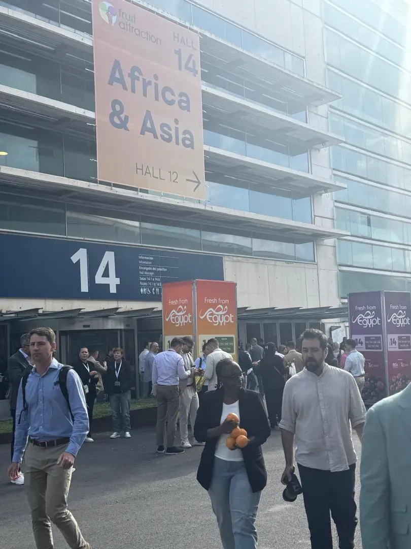 Visitors outside hall 14 at IFEMA MADRID under a Fruit Attraction banner reading Africa and Asia