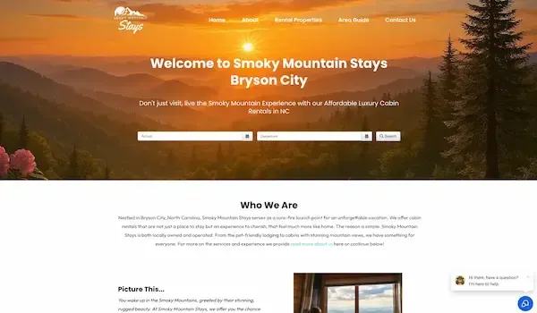 screenshot of a website for Smoky Mountain Styas. the image has a booking widget with a full screen hero header of a sunset over the mountains