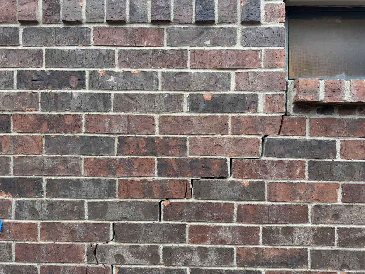 Stair step brick cracks from foundation movement