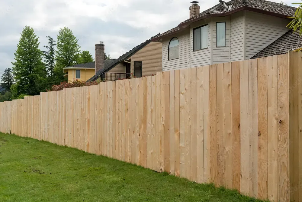 a fencing company installs a gate