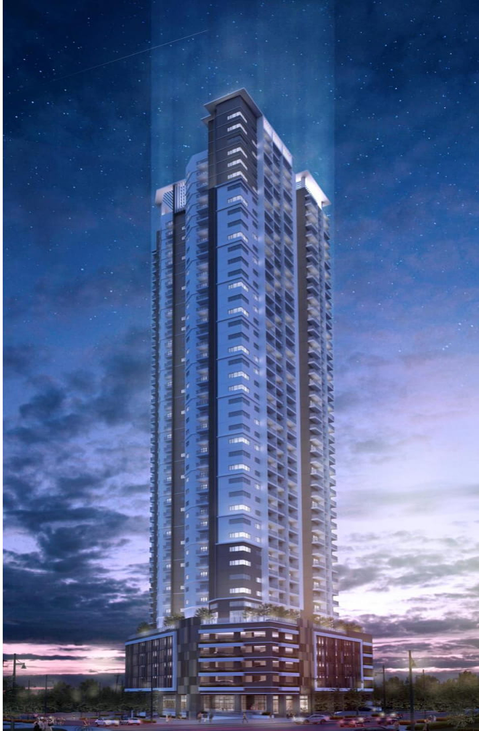 Metro Manila condo tower facade lit at night, representing a completed turnover-ready building