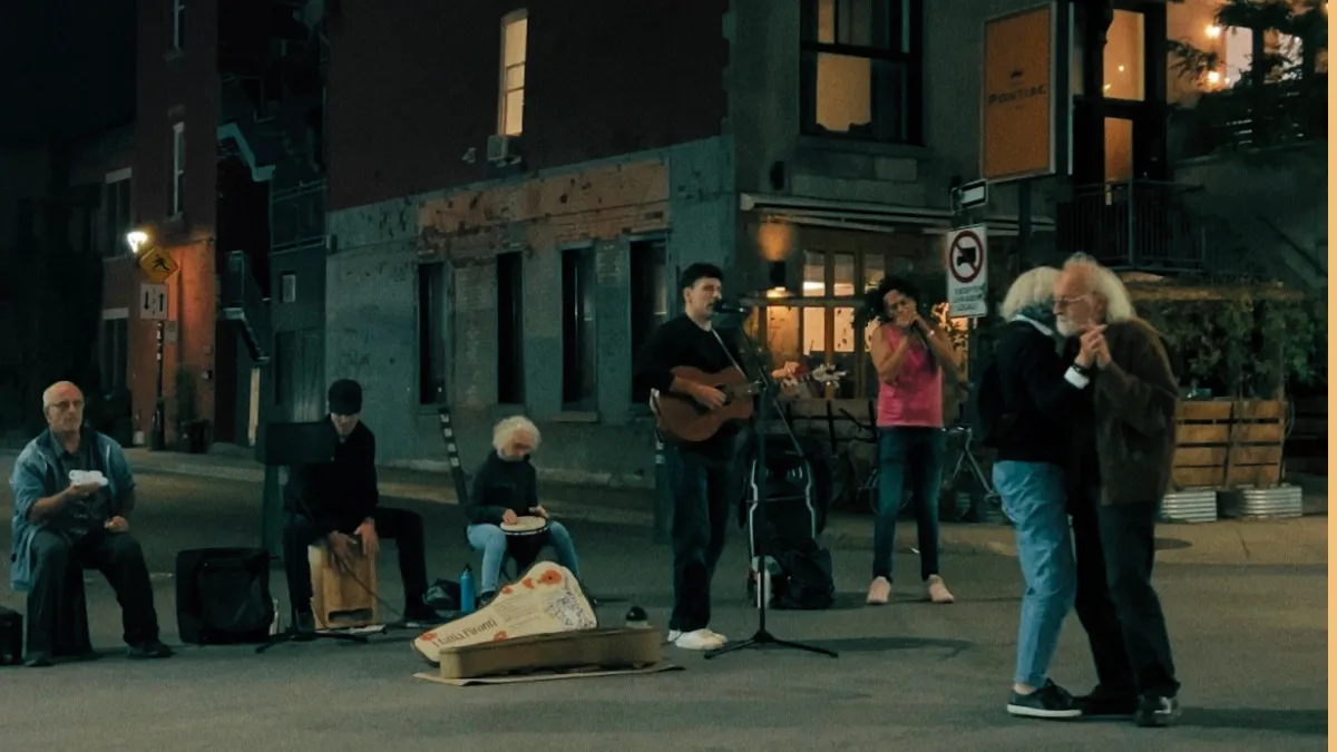 Mattia Pironti leading an Open Circle gathering in Montreal, surrounded by participants in a circle formation during an immersive music healing ritual"