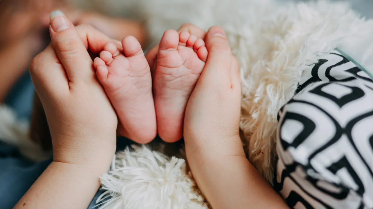 a group of people doing yoga in a park