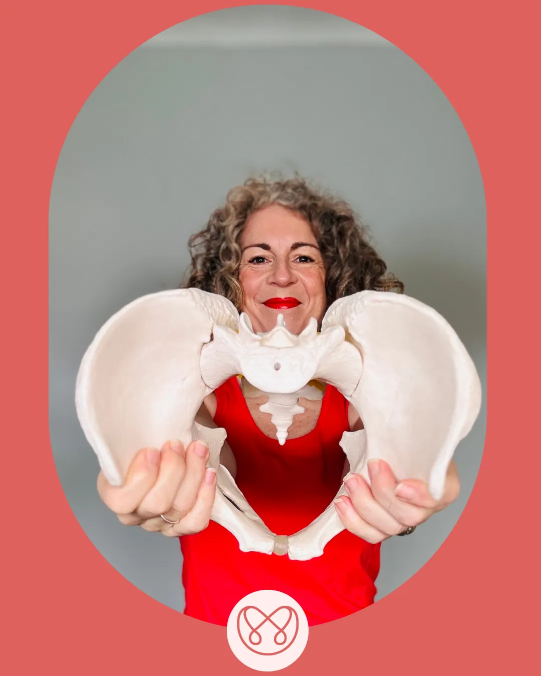 Claire holding a Pelvic Floor Model
