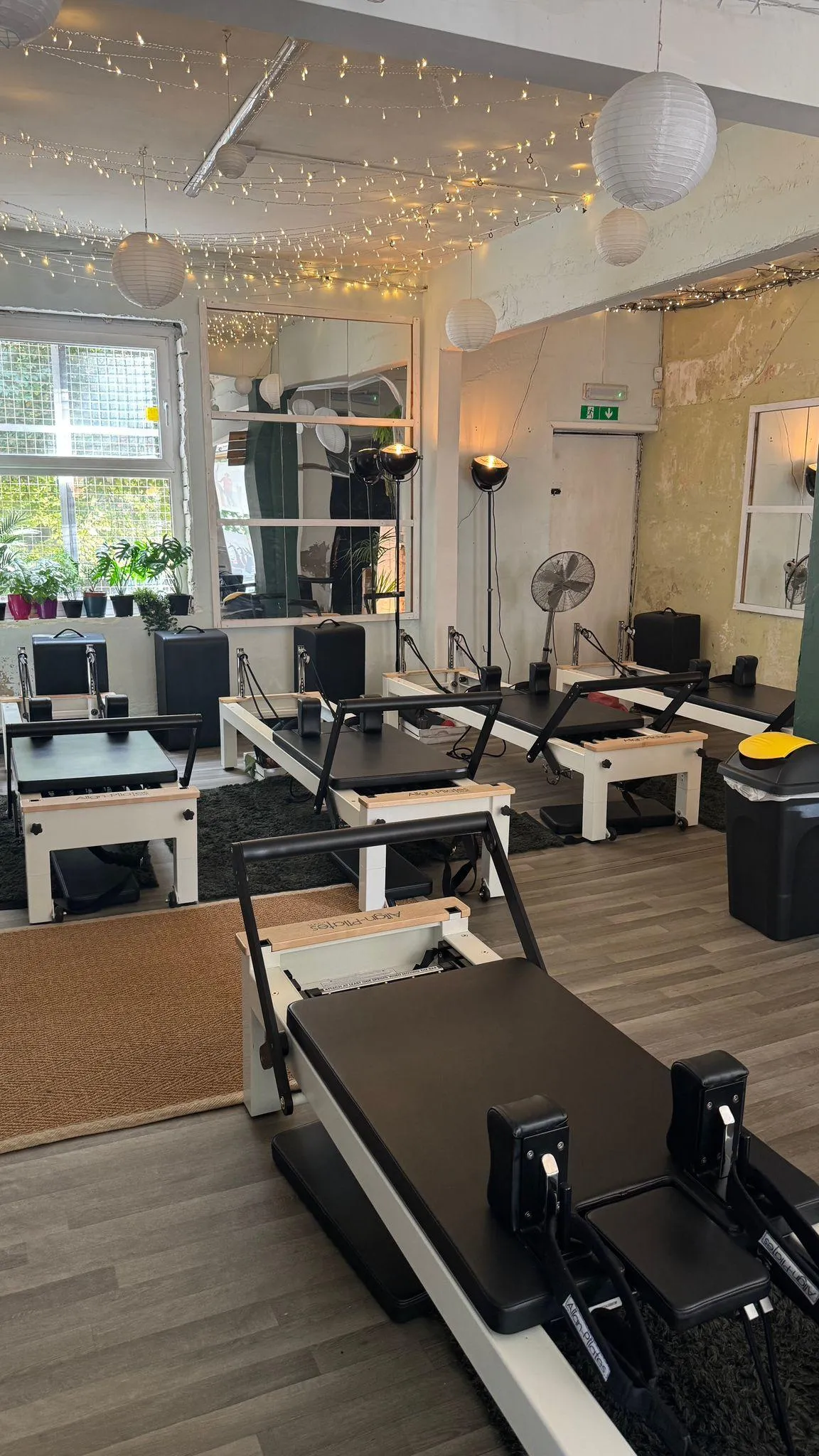 Lady doing Pilates on the reformer