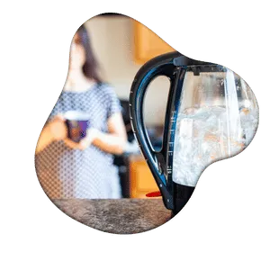 woman waiting for kettle to boil