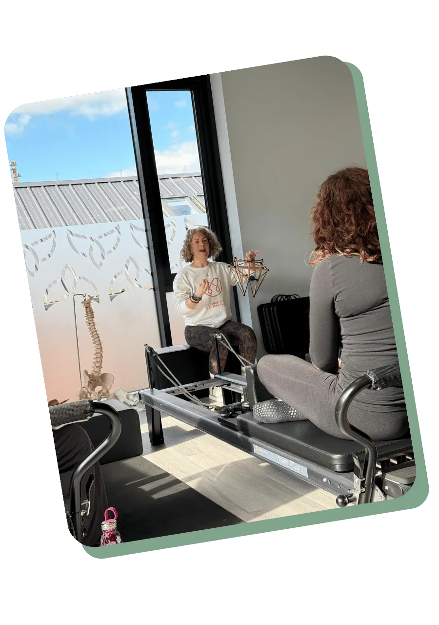 Claire teaching people pilates on the course