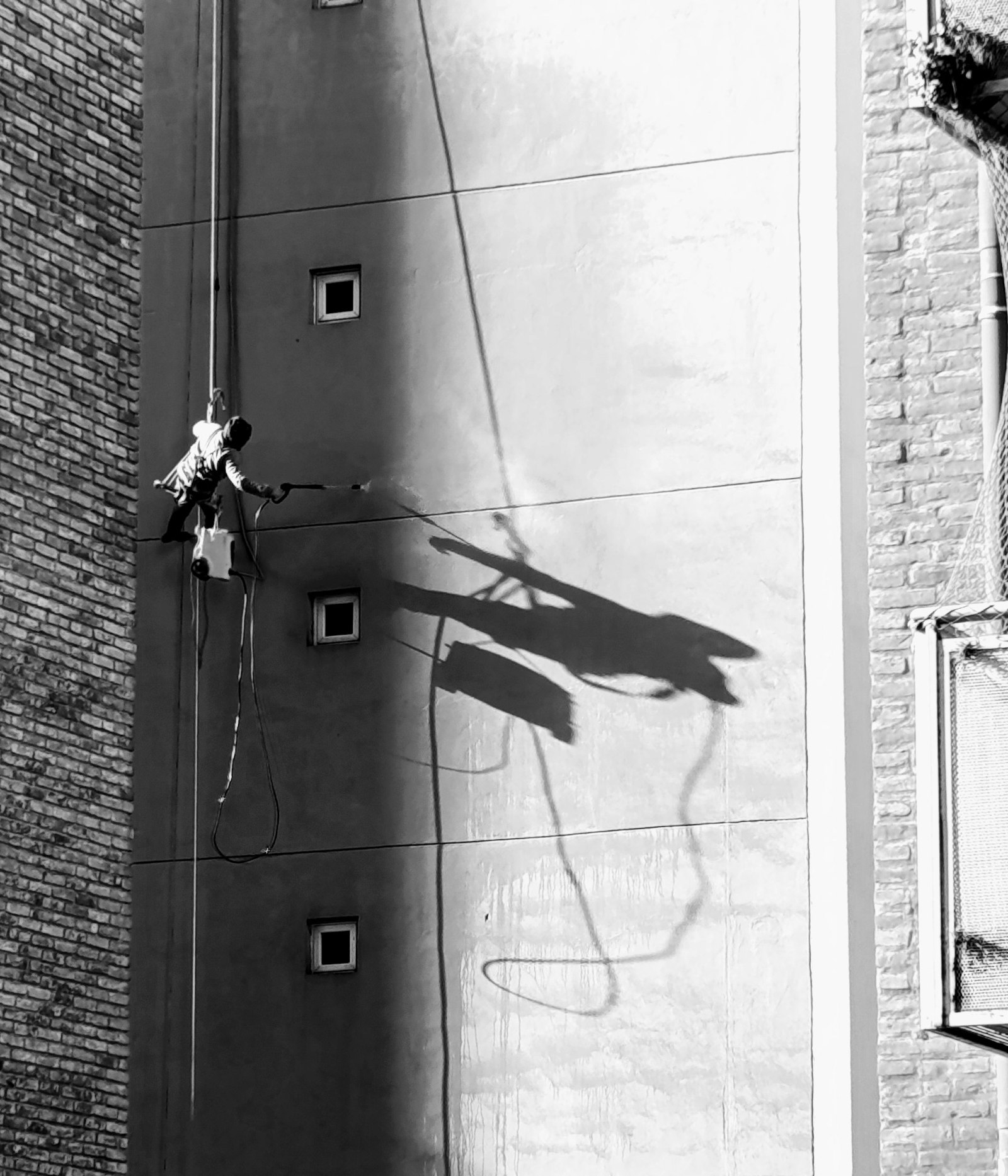 Pressure Washing and Surface Prep: The Difference Between a 15-Year and a 5-Year High-Rise Paint Job