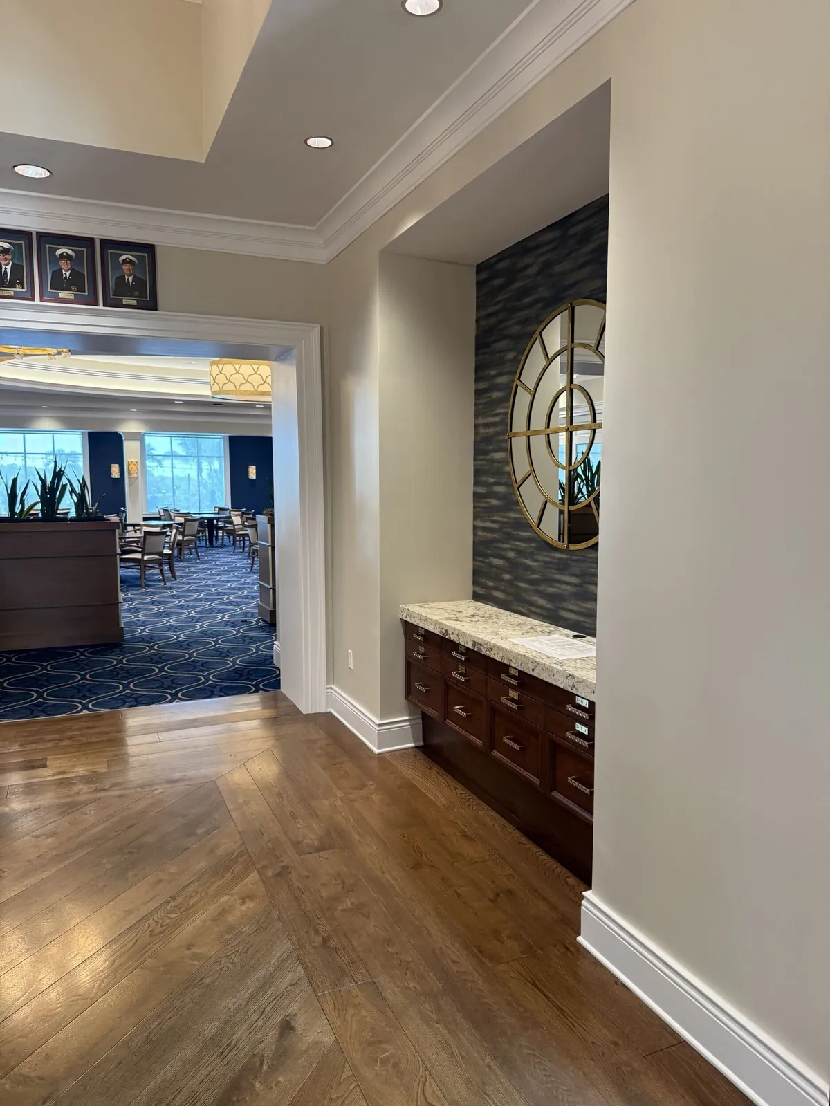Freshly painted entry hallway with wood floors at Pelican Isles Yacht Club