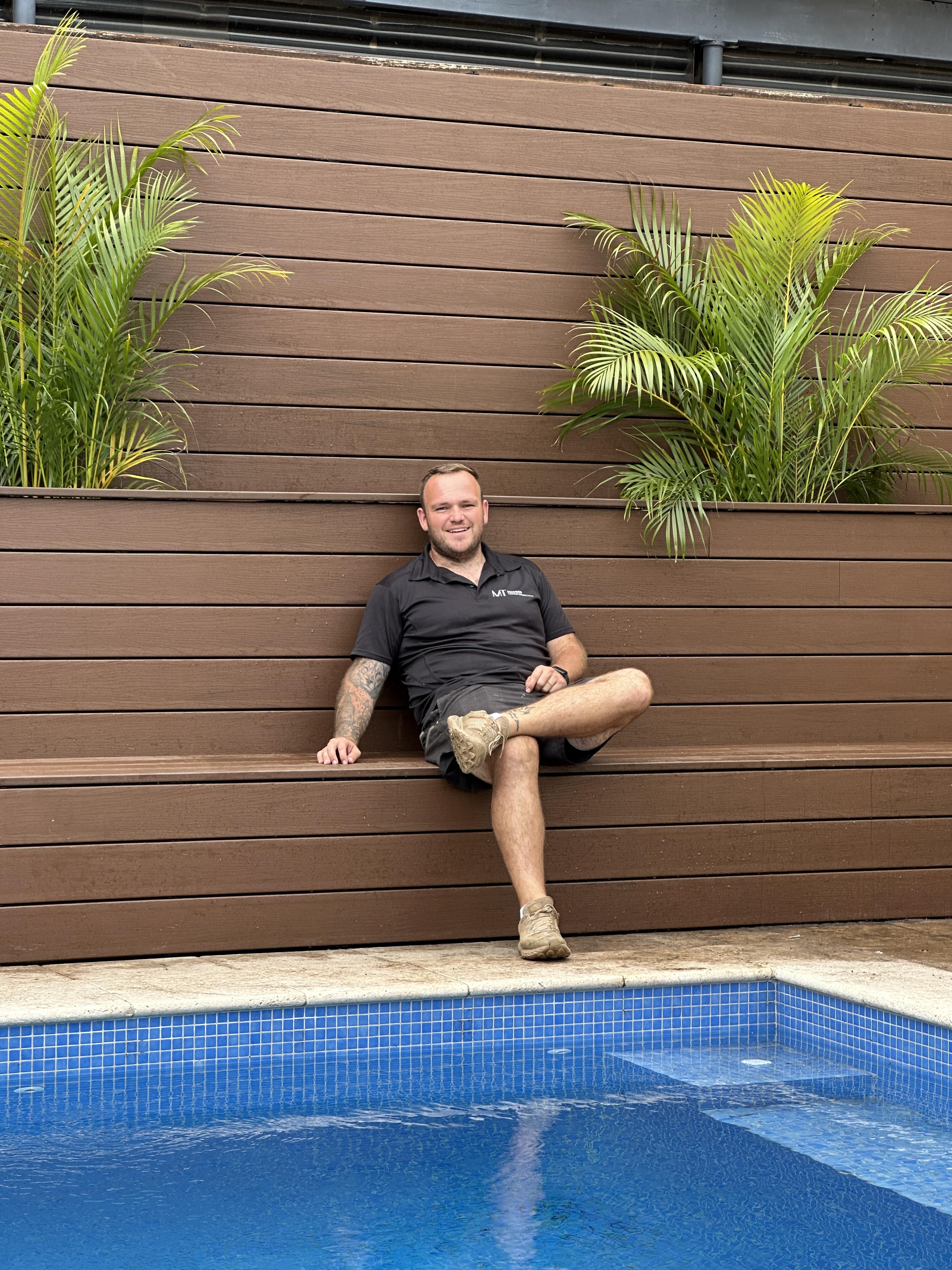Michael, Founder of Modern Transformations, on a job site