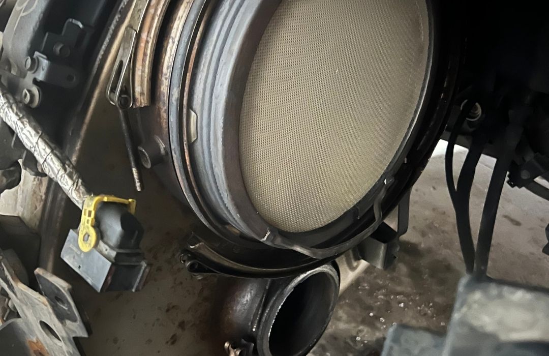 Clogged DPF filter inspected before cleaning or replacement