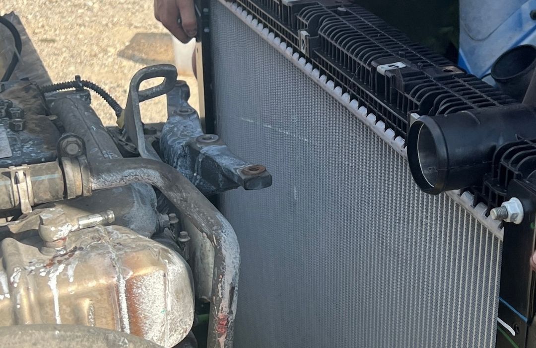 Semi truck radiator and A/C condenser area during A/C repair