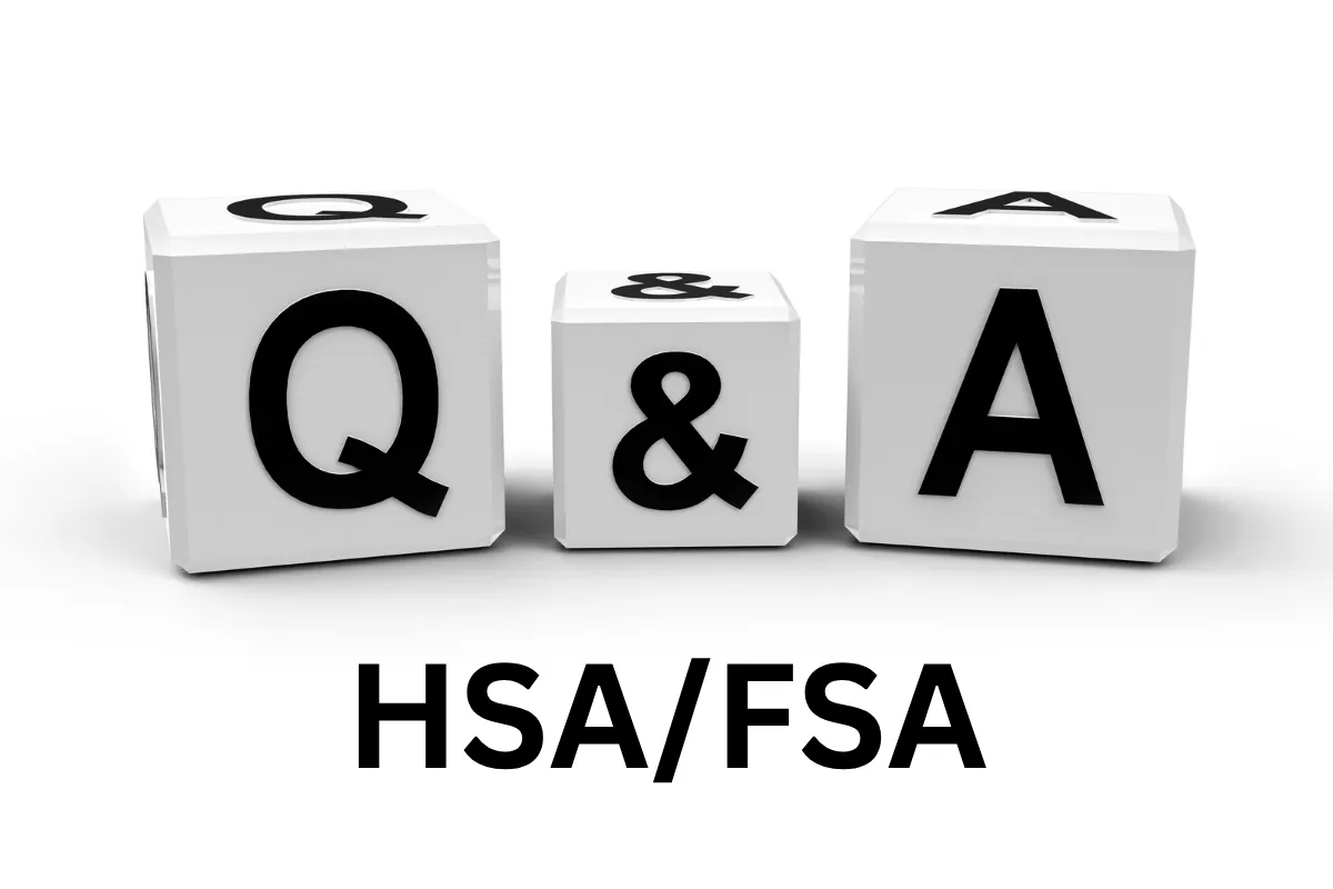Three white blocks with bold black letters displaying ‘Q & A’ placed above the text ‘HSA/FSA,’ symbolizing a question-and-answer session or informational content related to Health Savings Accounts and Flexible Spending Accounts.