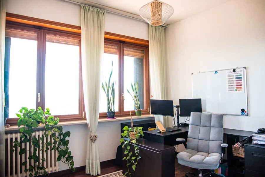 white and brown concrete building under blue sky during daytime