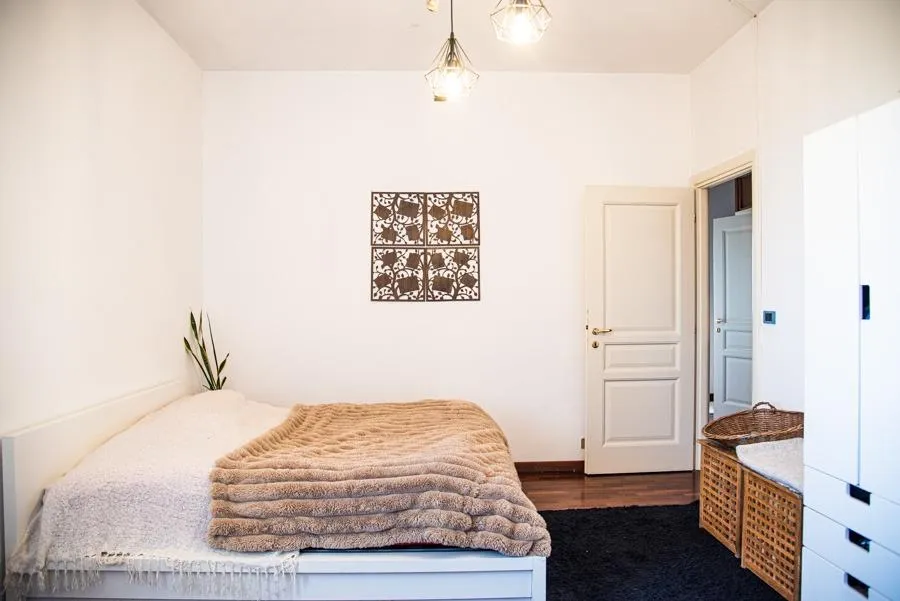 white and brown concrete building under blue sky during daytime