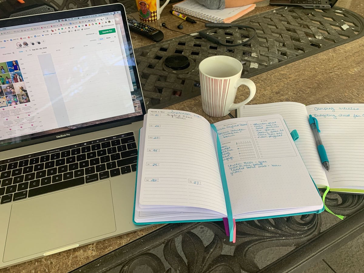 black laptop computer on table